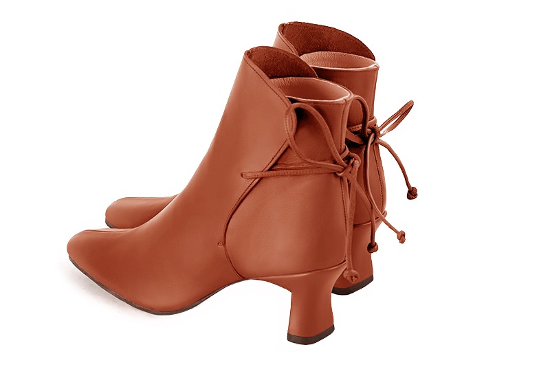 Terracotta orange women's ankle boots with laces at the back. Square toe. Medium spool heels. Rear view - Florence KOOIJMAN